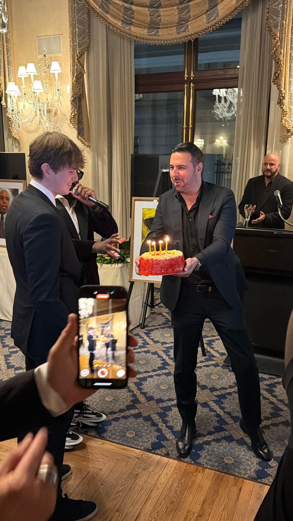 A celebration during the Harmonie Club evening, photographed October 23, 2025.