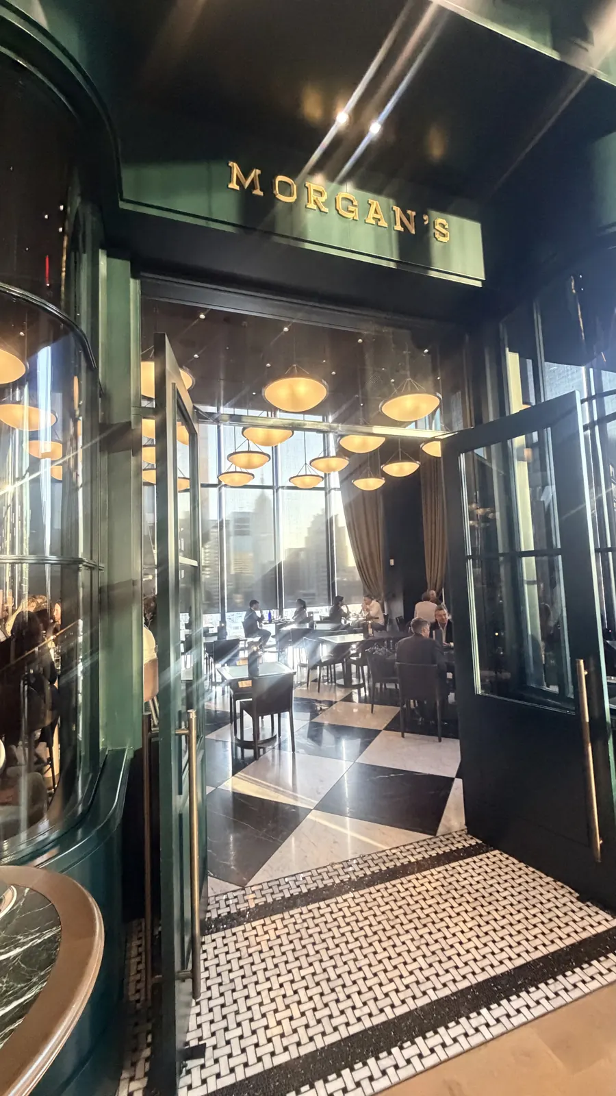 Green-and-gold entrance to Morgan’s inside 270 Park Avenue