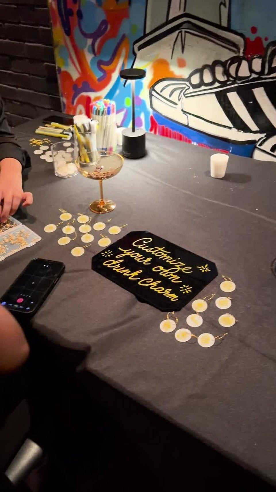 The drink-rim station and tabletop launch details. Video still.