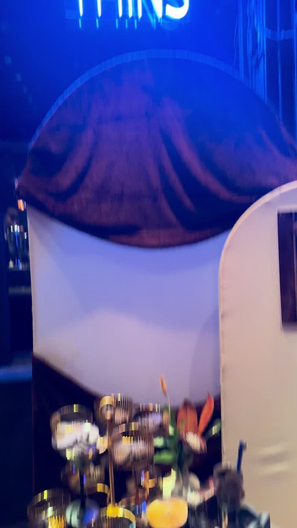 A blue-lit OREO Thins display and desserts. Video still.