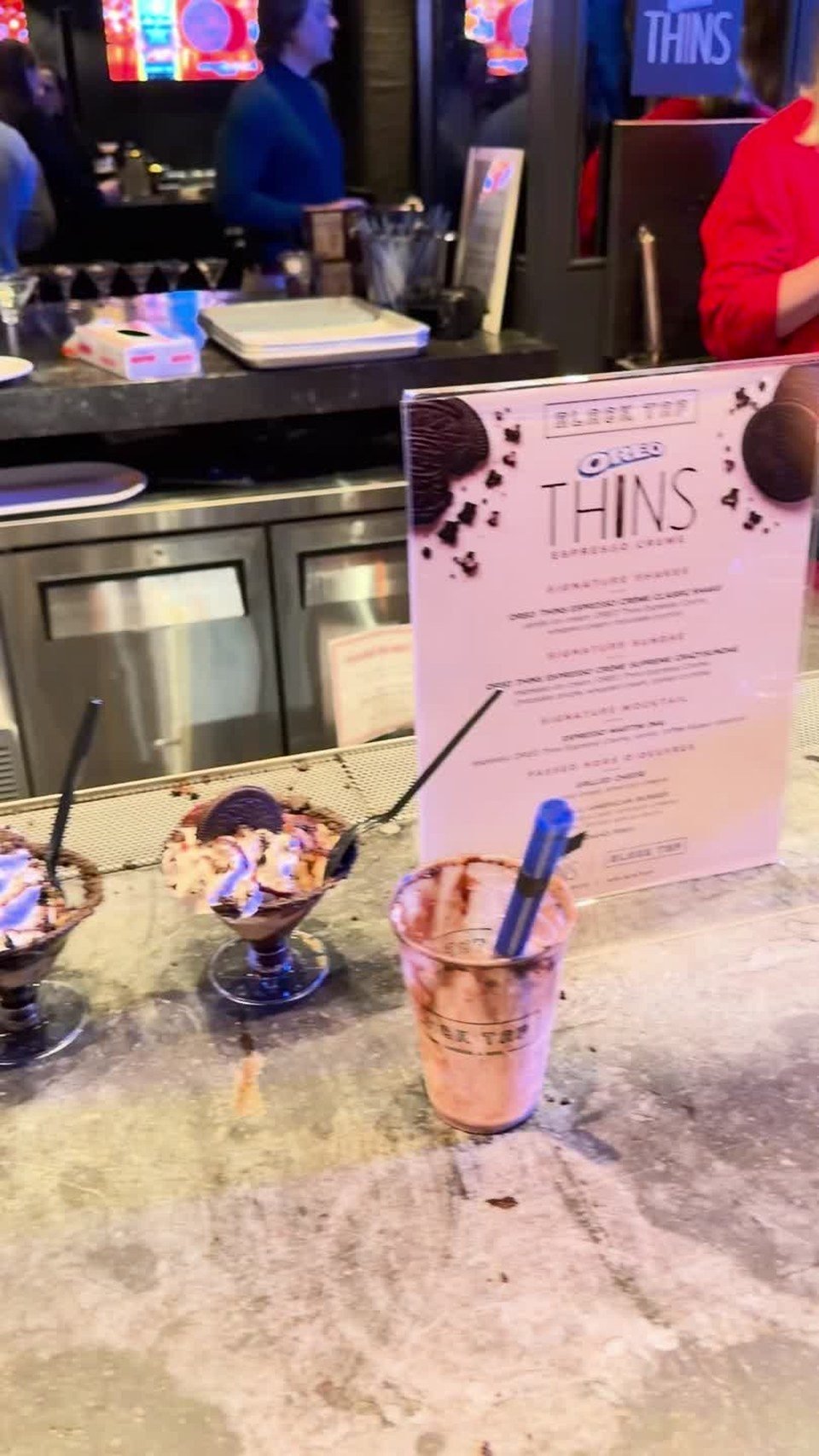 Shakes, sundaes and the OREO Thins menu at the bar. Video still.