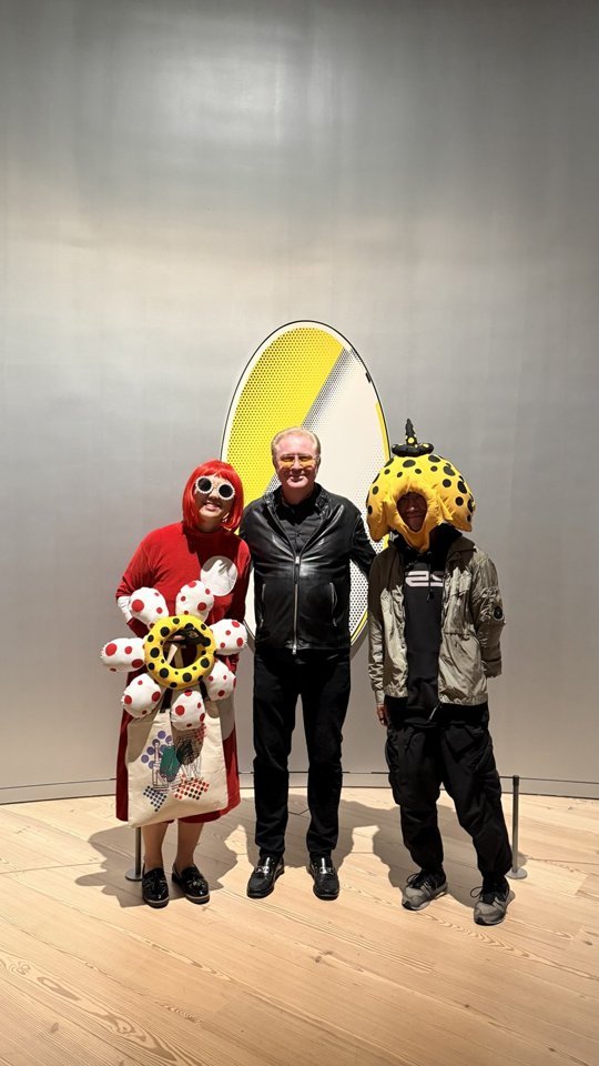 Costumed guests among Roy Lichtenstein’s paintings.